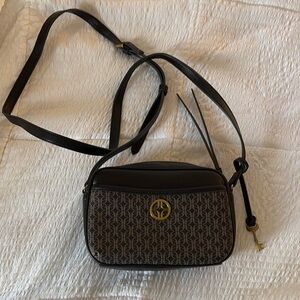 Fossil crossbody bag with matching wallet. Only used once.